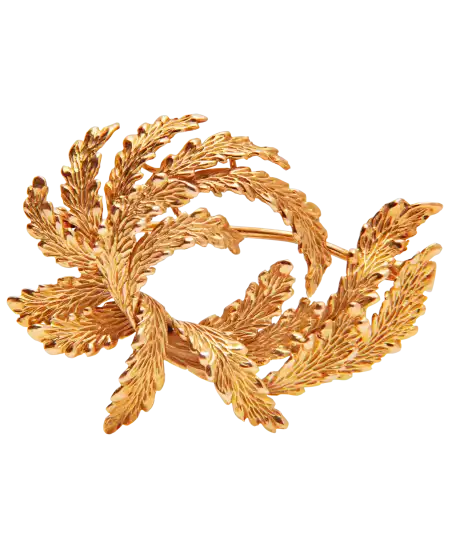 La broche Victorieux Lauriers est un bijou raffiné, qui se distingue par ses détails soignés et son élégance intemporelle.