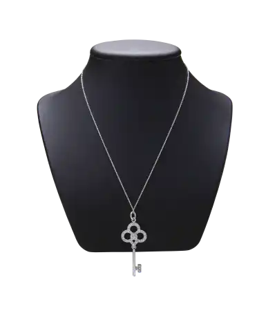 TIFFANY KEYS Kroon Sleutel in 18 karaat witgoud met diamanten. Verkrijgbaar bij VIRTU LUXURY.